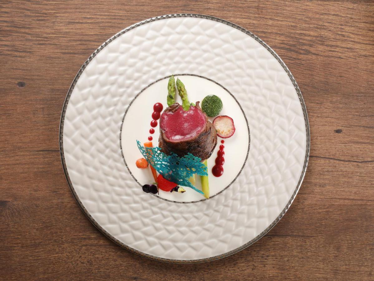 Peridot Grand Luxury Boutique Hotel هانوي المظهر الخارجي الصورة A plate of food
